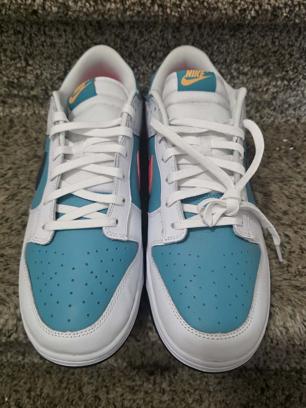 Nike Men's Low-Top. Nike Dunk Low 'Dusty Cactus Thunder Blue' sneaker.